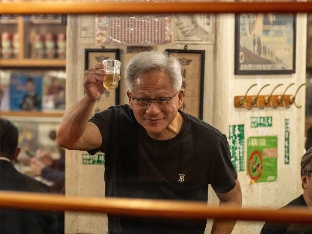 Nvidia CEO Jensen Huang raises a drink to China