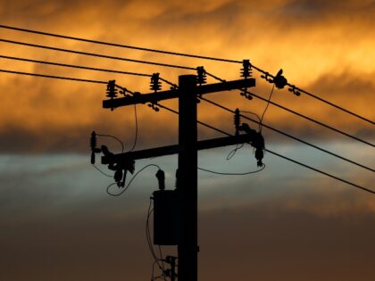 Powerlines against a bright sky