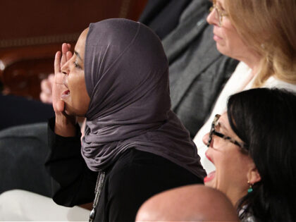 WASHINGTON, DC - FEBRUARY 24: Rep. Ilhan Omar (D-MN) shouts during U.S. President Donald T