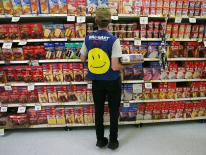 Walmart worker stocks shelves