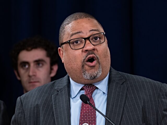 bragg reports NEW YORK, NEW YORK - MAY 30: Manhattan District Attorney Alvin Bragg stands with members o