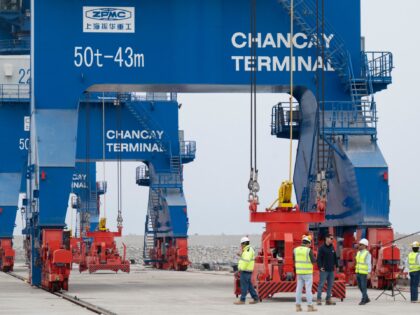 Workers are seen at the Chancay "megaport" in the small town of Chancay, 78 kilometers nor