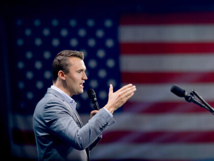 WEST PALM BEACH, FLORIDA—JULY 26: Charlie Kirk, who founded Turning Point USA, speaks be