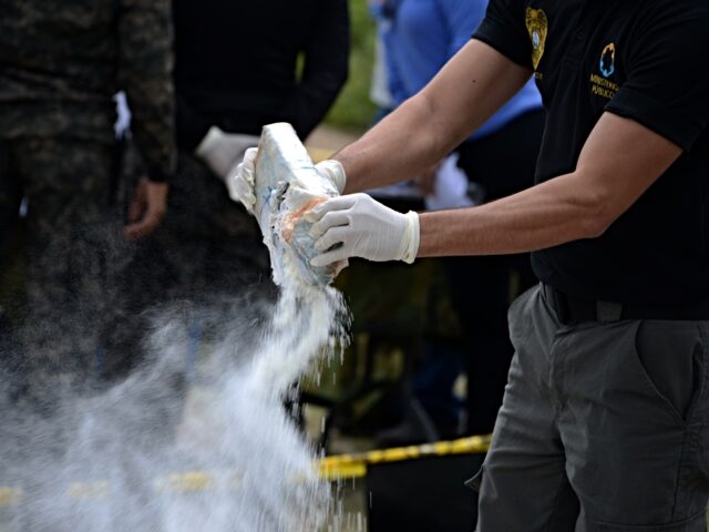 Anti-narcotics and Military Police officers prepare everything for the incineration of mor