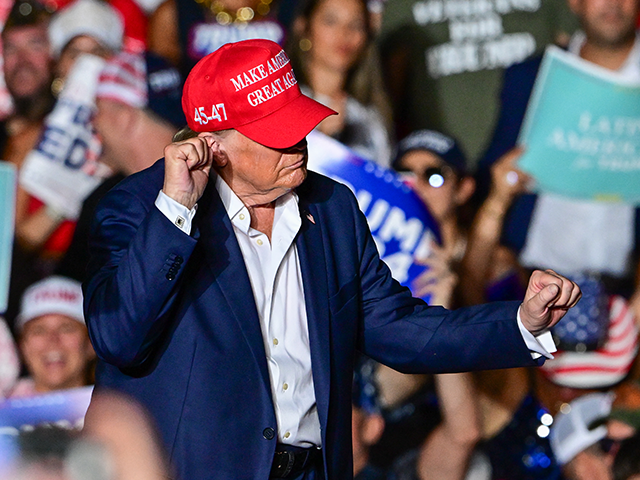 Donald Trump dances during a rally in Doral, Florida, on July 9, 2024. (GIORGIO VIERA/AFP