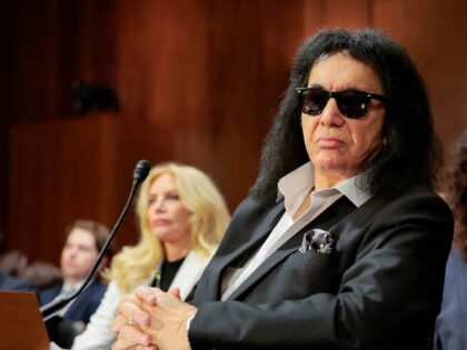 WASHINGTON, DC - DECEMBER 09: Gene Simmons, a founding member of the rock band KISS, testi
