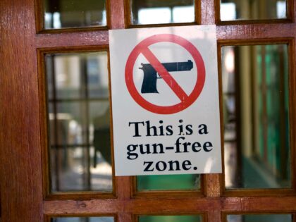 A Gun free zone sign on the entrance door of the Lavender Hill township Community Centre i
