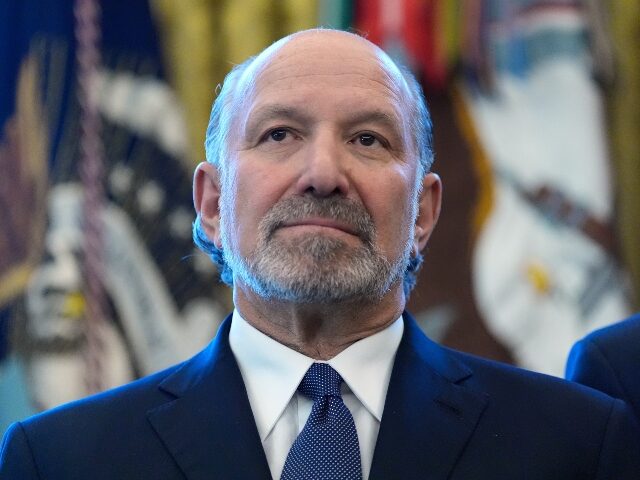 howard-lutnick-AP Commerce Secretary Howard Lutnick listens during an event with President Donald Trump in t