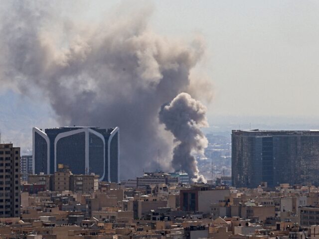 Plumes of smoke rise following reported explosions in Tehran on March 1, 2026. Ayatollah A