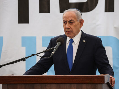 Israel's Prime Minister Benjamin Netanyahu delivers a speech during the funeral of Israeli