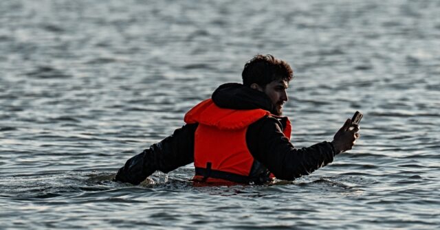 Illegal Migrants Given Monetary Compensation for Having Phones Seized