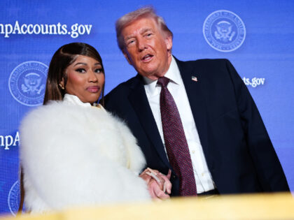WASHINGTON, DC - JANUARY 28: Musician Nicki Minaj (L) joins U.S. President Donald Trump on