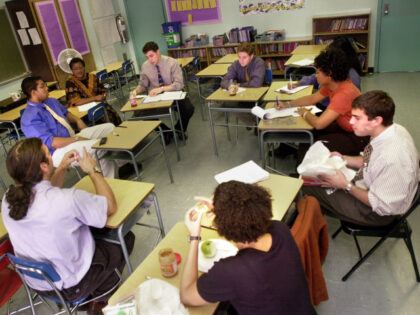 eachers and staff from "Knowledge is Power Program" (KIPP) Academy discuss stude