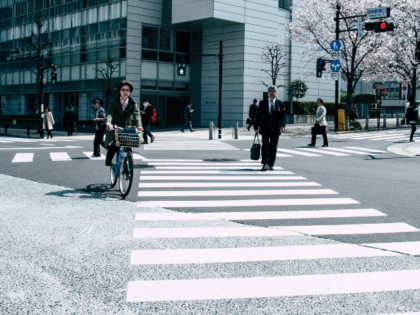 People Crossing Pedestrian Lane Intersection