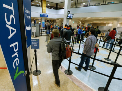 A passenger enters the Transportation Security Administration (TSA) pre-check line towards