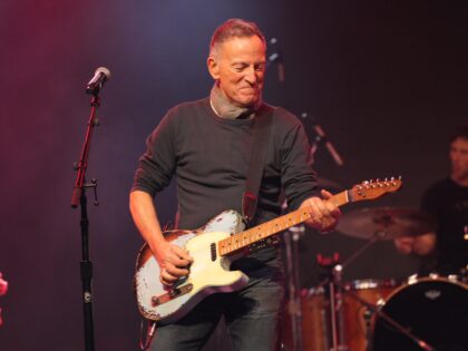 Rock icon Bruce Springsteen performs on stage as part of a rockstar-filled concert in prot