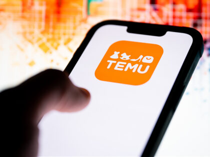 POLAND - 2025/12/04: In this photo illustration, a Temu logo seen displayed on a smartphon