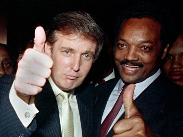 Promoter Donald Trump joins presidential hopeful Jesse Jackson at a party at Trump Plaza b