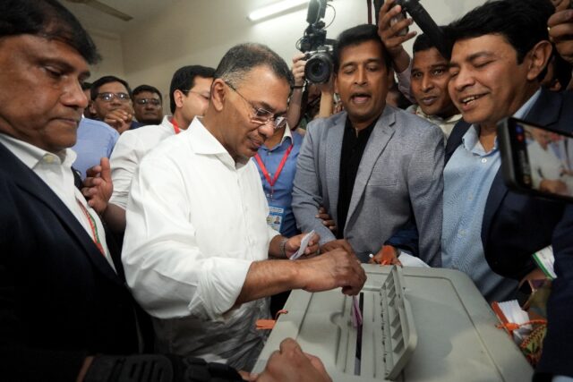 Bangladesh Nationalist Party (BNP) chairman and election candidate Tarique Rahman (C) cast