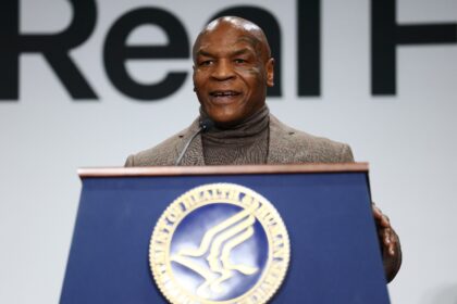 Former boxing champ Mike Tyson speaks at a Trump administration event encouraging American