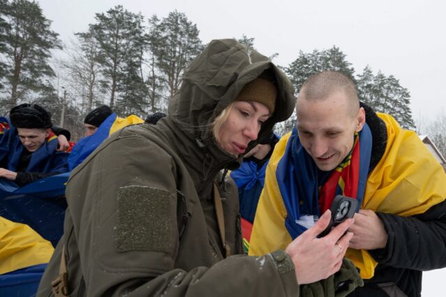 Family members joyfully and apprehensively waited to be reunited with loved ones captured
