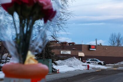 Flowers are placed near Tumbler Ridge Secondary school two days after the rural community