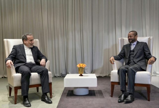 Iranian Foreign Minister Abbas Araghchi (L) meets with his Omani counterpart Badr Albusaid