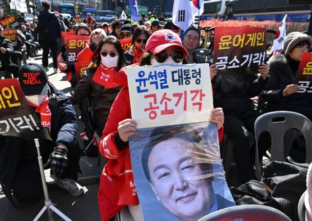 Supporters of South Korea's impeached former president Yoon Suk Yeol gather in front