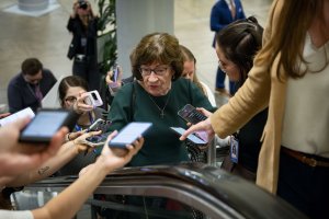Susan Collins announces re-election bid by unboxing running shoes