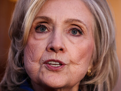 Former US Secretary of State Hillary Clinton speaks to the press after her a deposition wi