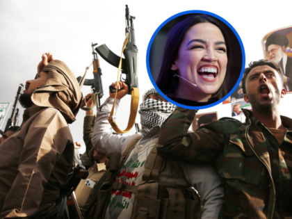 Thousands of demonstrators holding Iranian flags and portraits of Khamenei gather at Sebee