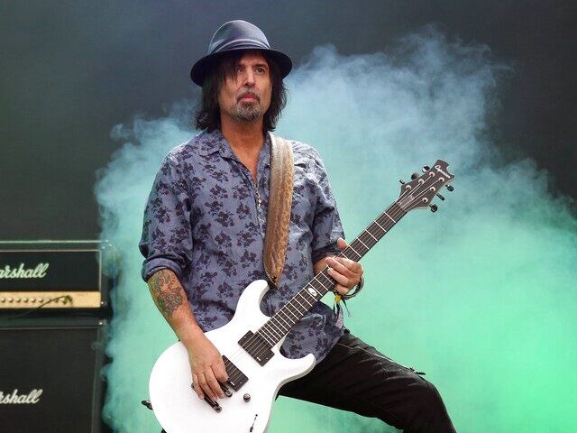 Motorhead lead guitarist Phil Campbell performs on the Pyramid stage during Glastonbury Mu
