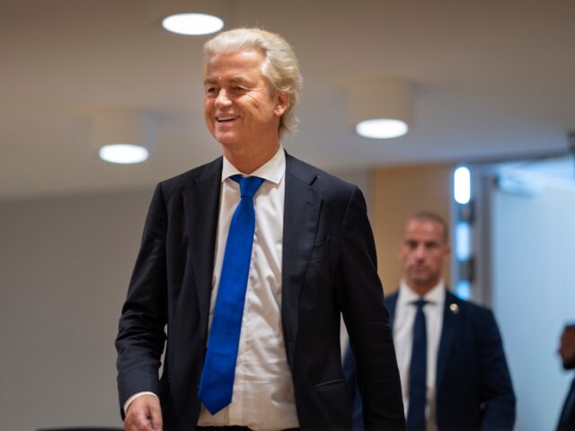 Anti-Islam lawmaker Geert Wilders greets judges when entering the high security court at S