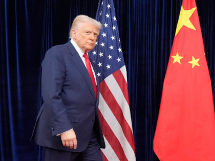 President Donald Trump walking in for his meeting with and Chinese President Xi Jinping at