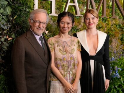 Steven Spielberg, left, the producer of "Hamnet," poses with the film's director and co-wr