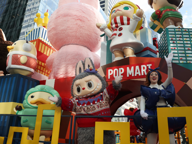 The Labubu float from Pop Mart makes its way down Sixth Avenue during the Macy's Than