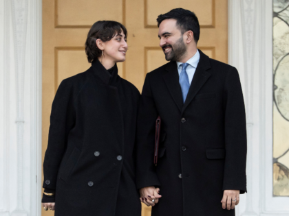 New York Mayor Zohran Mamdani, right, and his wife Rama Duwaji look at each other after a