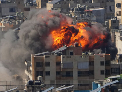 Title: APTOPIX Lebanon Israel Iran Image ID: 26068404342012 Article: Flames rise after an