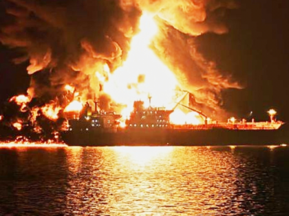 An oil tanker burns after being hit by an Iranian strike in the ship-to-ship transfer zone