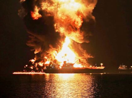 An oil tanker burns after being hit by an Iranian strike in the ship-to-ship transfer zone