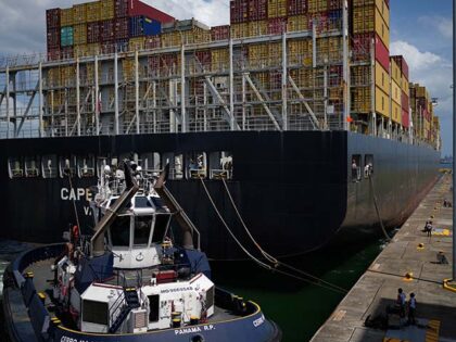 Title: Panama Canal Image ID: 26071839406725 Article: A cargo ship traverses the Cocoli Lo