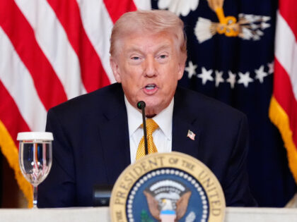 President Donald Trump speaks during a board meeting of the John F. Kennedy Memorial Cente