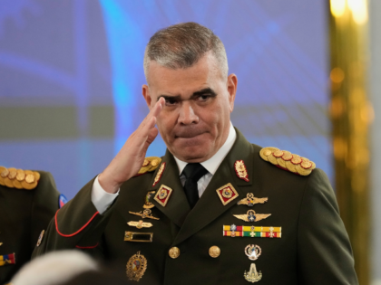 FILE - Defense Minister Vladimir Padrino Lopez salutes before a press conference in Caraca