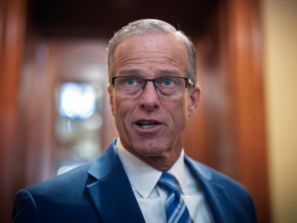 Senate Majority Leader John Thune, R-S.D., talks with reporters asking about a proposal to