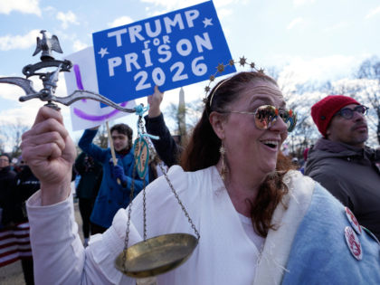 Demonstrators rally near the Washington Monument during the No Kings protest in Washington
