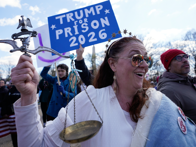 Demonstrators rally near the Washington Monument during the No Kings protest in Washington