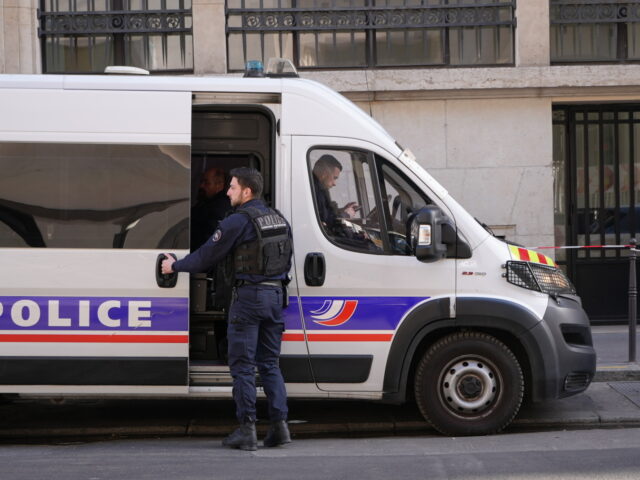 France Bank of America Attack Thwarted Police stand outside the Bank of America building in Paris, Saturday, March 28, 2026. (AP