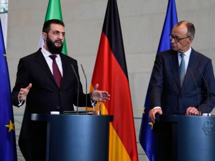 German Chancellor Friedrich Merz, right, and Syrian President Ahmad al-Sharaa attend a pre