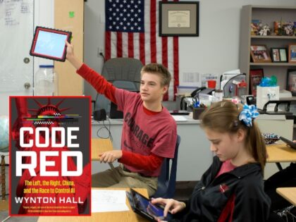 CODE RED students holding their tablets