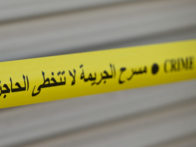DOHA, QATAR – FEBRUARY 28: Yellow police barricade tape with the warning 'CRIME SCE